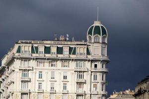 genoa town cityscape panorama from the sea harbor photo