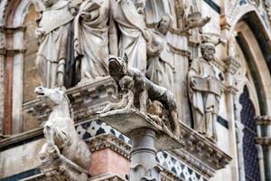 Siena dome cathedral external view detail of statue wolf with romolus and remus photo