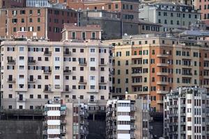 genoa town cityscape panorama from the sea harbor photo