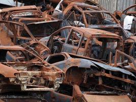 junkyard old rusted car field photo