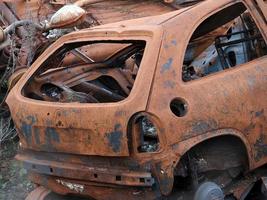 junkyard old rusted car field photo