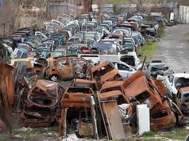 junkyard old rusted car field photo