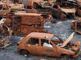 junkyard old rusted car field photo