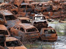 junkyard old rusted car field photo