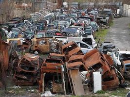 junkyard old rusted car field photo