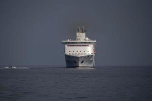 ferry ship frontal view while entering harbor photo