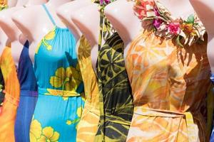 colorful pareo and polynesian dress for sale at market photo