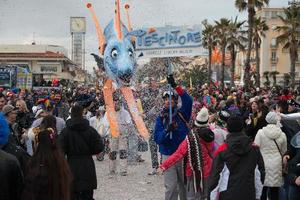 VIAREGGIO, ITALY - FEBRUARY 17, 2013 - Carnival Show parade on town street photo