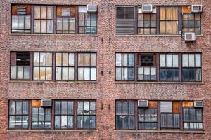 new york manhattan condos old windows and ac machines photo