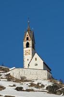 mountain church in winter photo