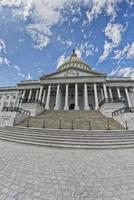 Full Washington DC Capitol on cloudy sky photo