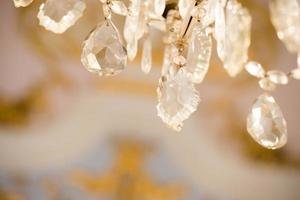 glass pendant detail of hall chandelier photo