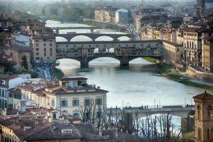 florencia ponte vecchio puesta de sol vista foto