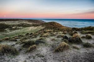 red sunrise in patagonia beach photo