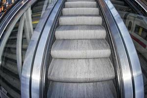 Metro moving escalator photo