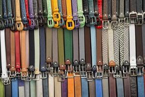 leather belts in italian shop in florence photo