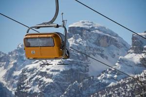 Chair Lift for skiers in winter snow time photo