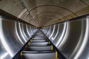 Underground Metro subway moving escalator