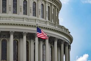 Washington DC Capitol view on cloudy sky background photo