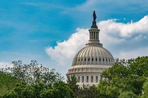 Washington DC Capitol view on cloudy sky photo