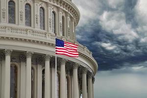 Washington DC Capitol view on cloudy sky background photo