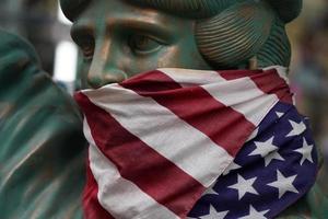 usa flag masked muzzled statue of liberty photo