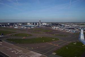 AMSTERDAM, NETHERLANDS - OCTOBER 26 2022 Schiphol Airport in Amsterdam, aerial view after taking off photo