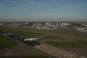 AMSTERDAM, NETHERLANDS - OCTOBER 26 2022 Schiphol Airport in Amsterdam, aerial view after taking off photo