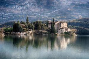 toblino castle view on winter day photo