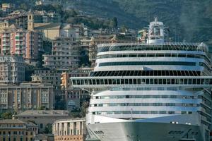 genoa town cityscape panorama from the sea harbor photo