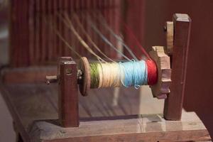 old sntique weaving machine detail photo