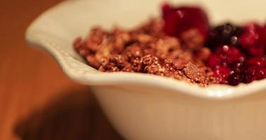 A Healthy Bowl Of Fruit Berries And Cereals - Slow Motion Pan Right video