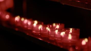 Red Wish and Pray Candles in a Catholic Church video