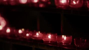 Red Wish and Pray Candles in a Catholic Church video