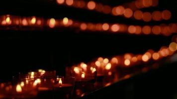 Red Wish and Pray Candles in a Catholic Church video