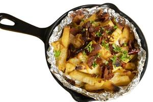 Bacon French Fries Baked Cheese On A White Background photo