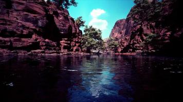 Reflection in Colorado River of Butte catching days last rays, in Grand Canyon. photo