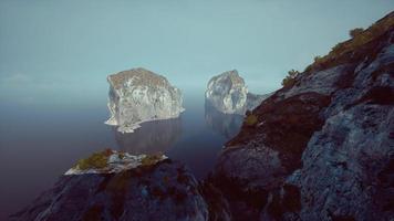 Aerial view of the beautiful cliffs in the sea photo