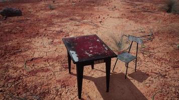 old ruster metal table in desert photo