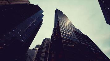 View looking up at high rise buildings photo