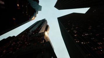 View looking up at high rise buildings photo