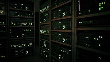 big data dark server room with bright equipment photo