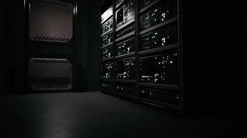 data center with multiple rows of fully operational server racks photo