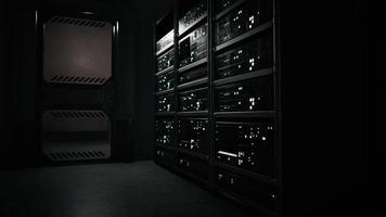 big data dark server room with bright equipment photo