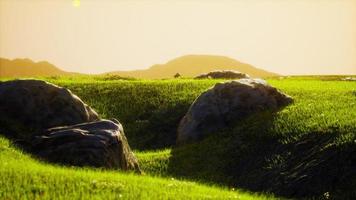 green mountain valley during sunrise photo