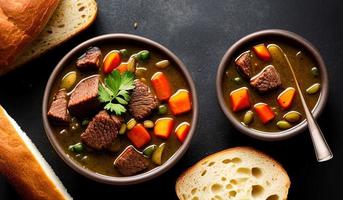 professional food photography close up of a a bowl of beef stew with bread on the side photo