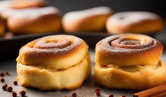 dvertising professional food photography close up of a pile of cinnamon rolls covered in sugar photo