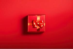 photo of a gift box with a red bow and hearts on a red background