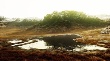 Panoramic view on mountains covered with snow photo