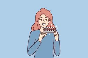 Woman holds device to determine shade of teeth passes test for quality of toothpaste. Long-haired girl demonstrates snow-white smile after whitening procedure at dentist. Flat vector illustration